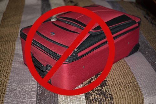 Travel Do Not Put Suitcase on Bed Bedbugs